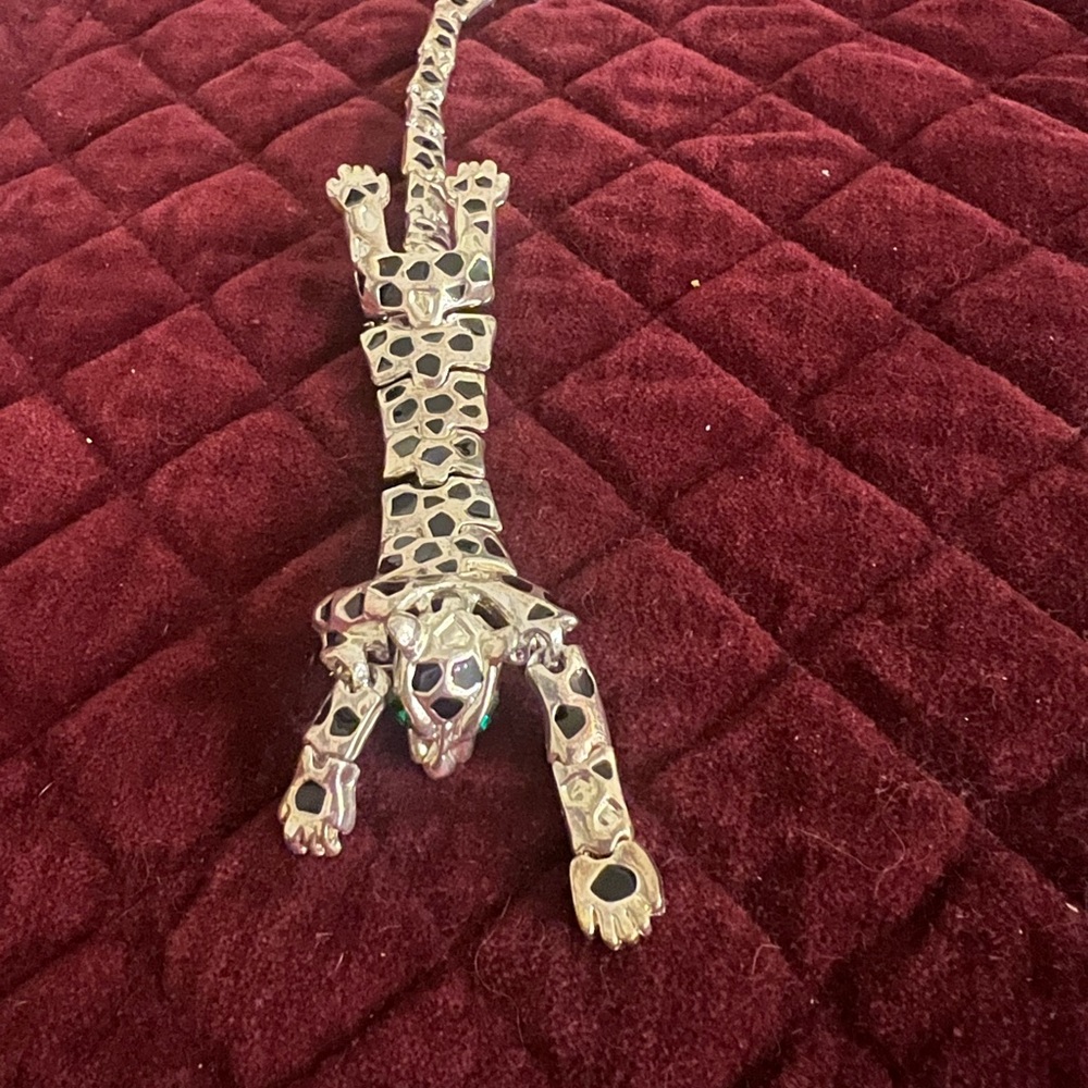 Vintage articulated silver leopard pin